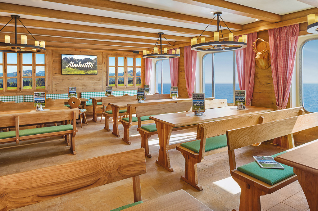 Restaurant mit Almhütten-Design und großen Panoramafenstern