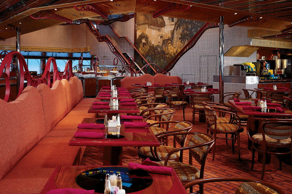 Cezanne Restaurant auf der Carnival Conquest mit eleganten Tischen und Dekorationen