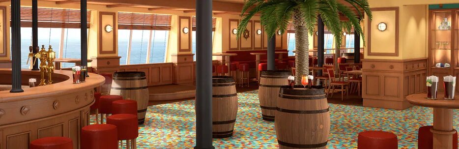 Redfrog Pub auf der Carnival Radiance mit tropischer Einrichtung, Holzfässern als Stehtische und roten Hockern.