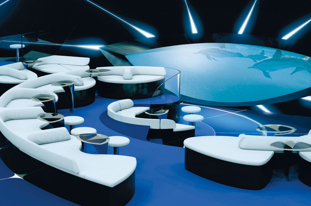 Blue Eye Unterwasserlounge mit geschwungenen Sitzbänken und Unterwasserprojektion an Bord der Le Bellot.