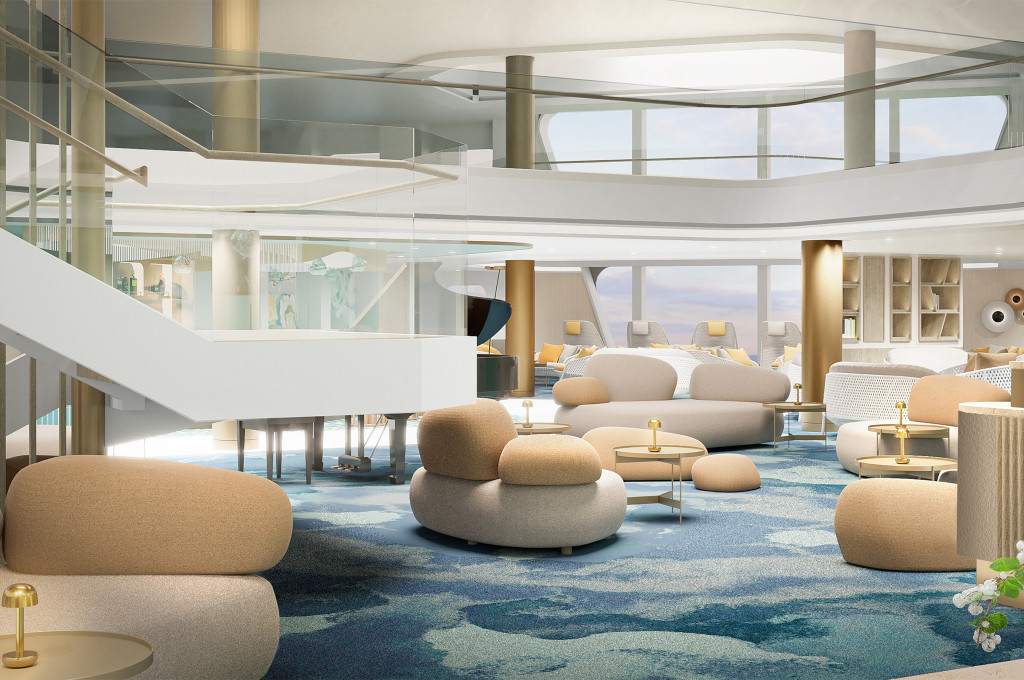 Mehrstöckiges Atrium mit organisch geformten Sofas, geschwungener Treppe und Designleuchten.