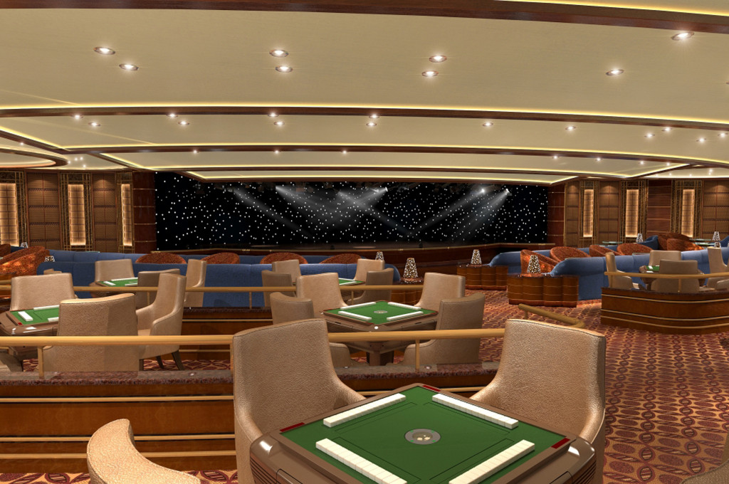 Vista Lounge mit mehreren Spieltischen und Sitzecken mit eleganten Möbeln auf der Majestic Princess.